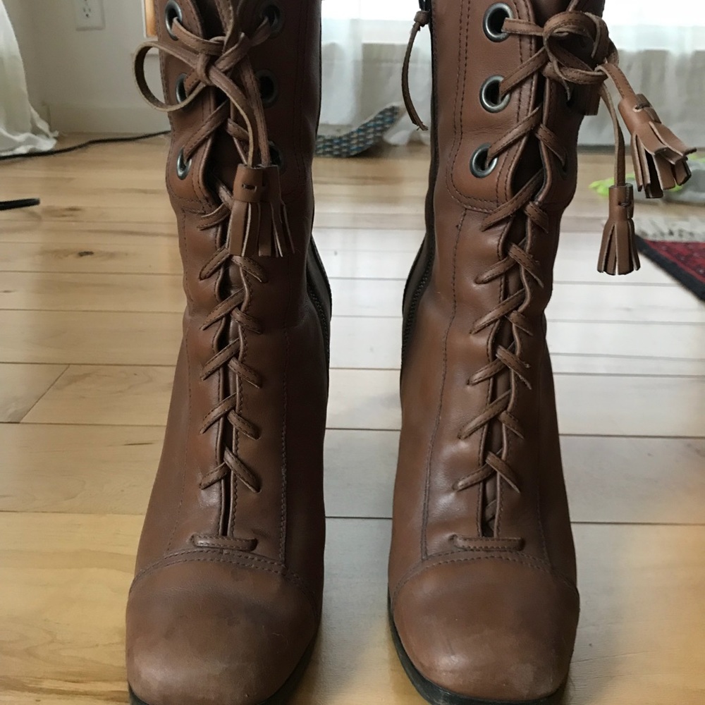 Miu Miu lace up mid boots. Wooden heel.